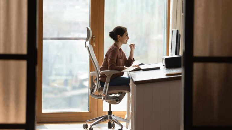 female sit at workplace
