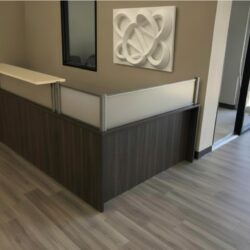 Gray 10f reception desk with white countertop