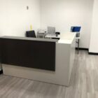 White Reception Desk with Gray Overlay