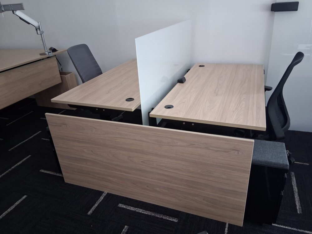 Height adjustable benching desks a Height adjustable benching desks a